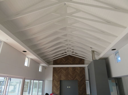 Cape Roof - Exposed Scissor Trusses and Isoboard Ceiling