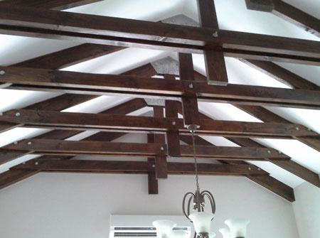 Cape Roof - Bolted Chapel Trusses Stained